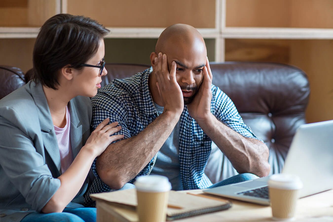 Businesswoman empathizing with her colleague